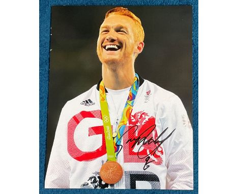 Athletics Greg Rutherford signed 14x11 Rio Olympics colour photo. Good condition. All autographs come with a Certificate of A