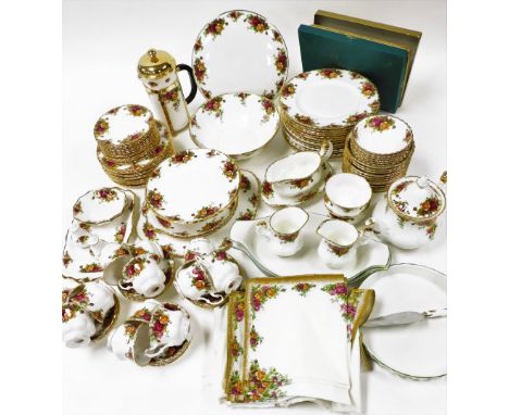 A Royal Albert porcelain dinner and tea service, decorated in the Old Country Roses pattern, few seconds, comprising a pair o