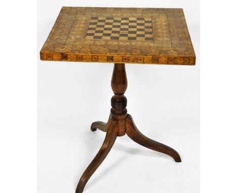 A Victorian parquetry tilt top games table, the square top with a chess board centre, raised on a baluster and ring turned co