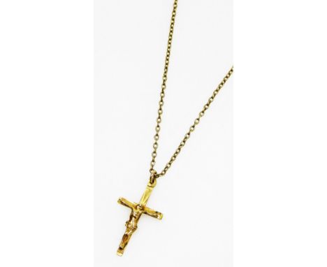 A 9ct gold crucifix pendant, on a silver gilt belcher link neck chain, on a bolt ring clasp, 3.7g all in. 