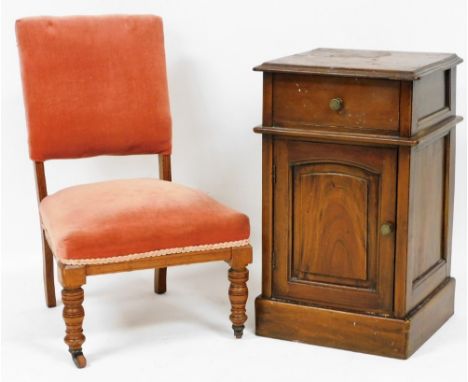 A Victorian walnut nursing chair, upholstered in red Draylon, raised on turned legs, together with a Continental mahogany pot