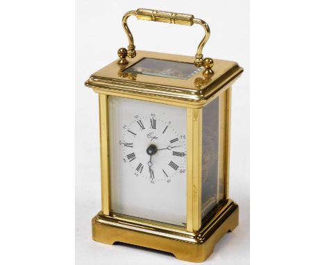 A 20thC brass carriage clock, retailed by Cope, enamel dial bearing Roman numerals, single barrel movement, in typical case w
