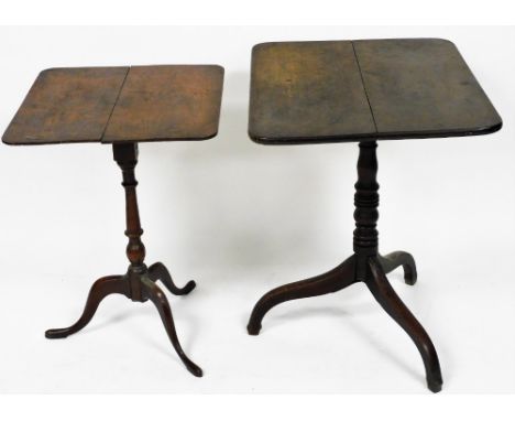 A late George III oak tilt top occasional table, with a rectangular top, raised on ring turned column over three cabriole leg