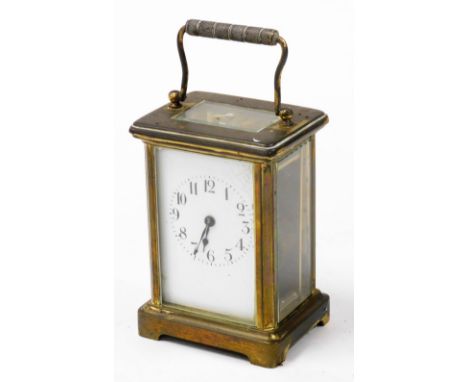 A 19thC brass cased carriage clock, enamel dial bearing Roman numerals, single barrel movement, in typical case, 11cm high, w
