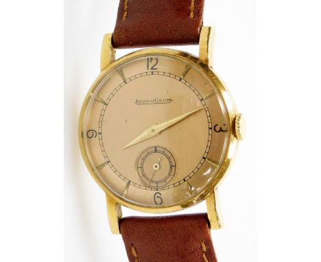 A Jaeger-Lecoultre gentleman's 9ct gold wristwatch, circular rose coloured dial bearing Arabic numerals at quarters, subsidia