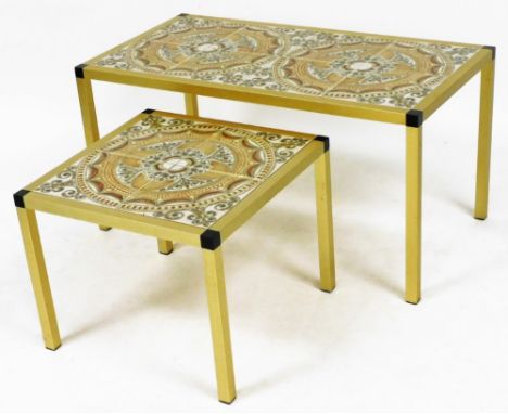 A mid century Danish brass and tile inset coffee table, of rectangular section, the top inset with eight tiles, raised on squ