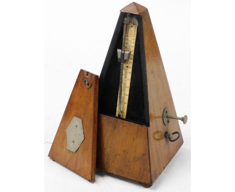 A metronome, Sabel for Maelzel, walnut case, 23cm high. 
