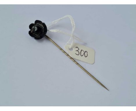 Another stick pin with a jet rose terminal 