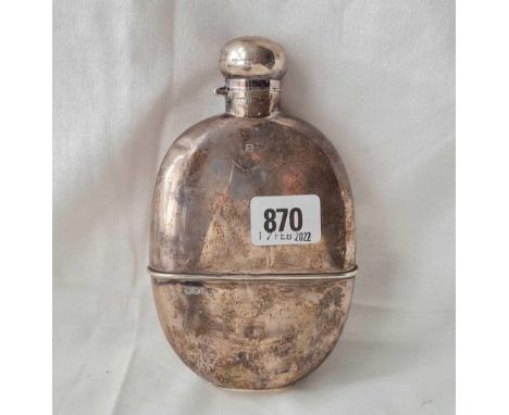 A large oval hip flask with detachable cup base, bayonet hinged cover - 6.5" high - Sheffield 1910 by W&amp;H - 266 g.