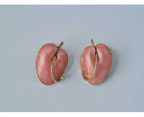 A pair of silver pink enamel lily pad design clip on earrings 