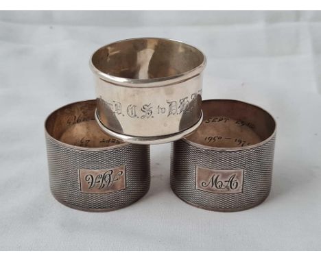 A pair of engine turned napkin rings, B'ham 1960 &amp; another (3), 58g