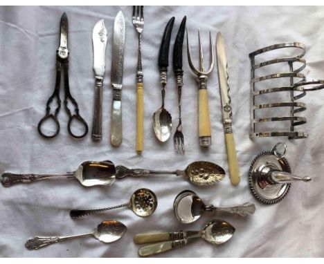 A Sheffield plated candlestick, toast rack etc