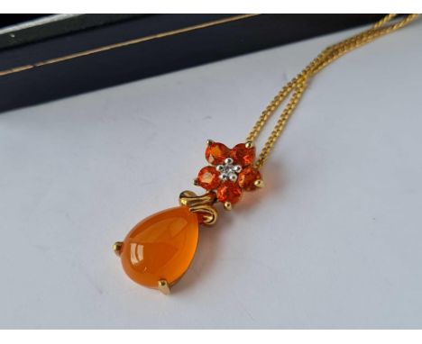 A attractive boxed fire opal and garnet and diamond pendant necklace 9ct 