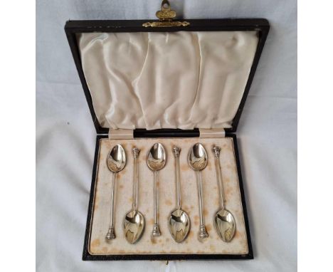 A set of six silver gilt and enamel back coffee spoons in fitted case - Birmingham 1937 