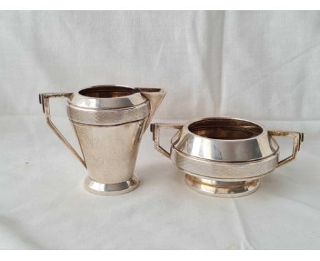 An Art Deco sugar basin cream jug - Birmingham 1935 by JG - 212 g.