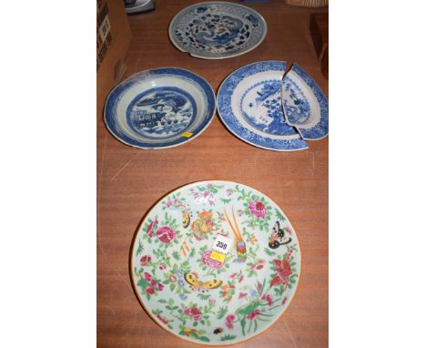 Three Oriental ceramic blue and white plates; another green Celadon coloured plate with hand-painted decoration depicting but