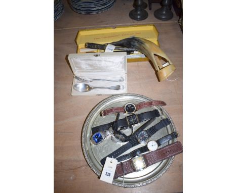 Eight gentleman's wristwatches; a silver plated tray; a Granton carving set; cased spoon and fork; and a horn ornament in the