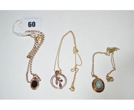 An Edwardian amethyst seed pearl pendant on chain; and two further pendants on chains.