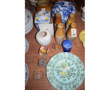 A collection of four glazed stoneware bottles, two inscribed 'A.N. Dodds, North & South Shields and Tynemouth'; one inscribed