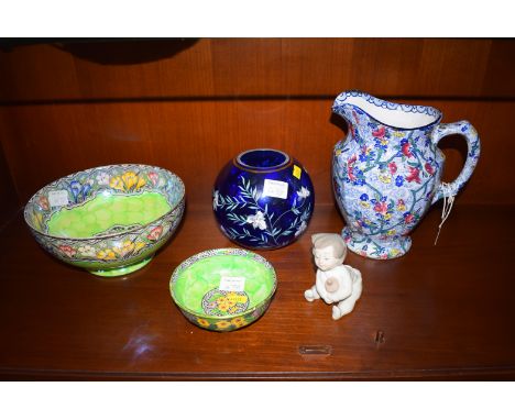 Maling ceramics, to include: a Chintz pattern Ringtons jug; two bowls; a Nao figure of a child; together with a blue glass va