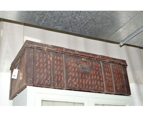A J. Burton & Bros. tin trunk.