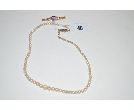 A cultured pearl graduated single row necklace; together with a 9ct. yellow gold and amethyst set bar brooch.