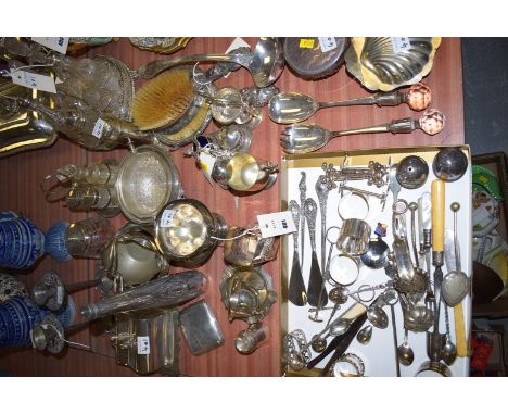 A large quantity of miscellaneous plated cutlery; condiments; an ashtray; candlesticks; salad servers; ladle; etc.