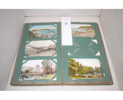 A vintage postcard album of local scenes.