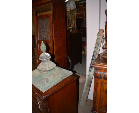 A dismantled 19th Century copper street lamp finial above square top, tapering sides, square base and cast iron mounting brac