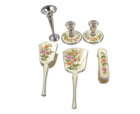 A silver and enamel four-piece dressing table set, Henry Clifford Davis, Birmingham 1961, comprising two brushes, hand mirror