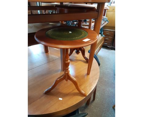 A REPRODUCTION TRIPOD TABLE