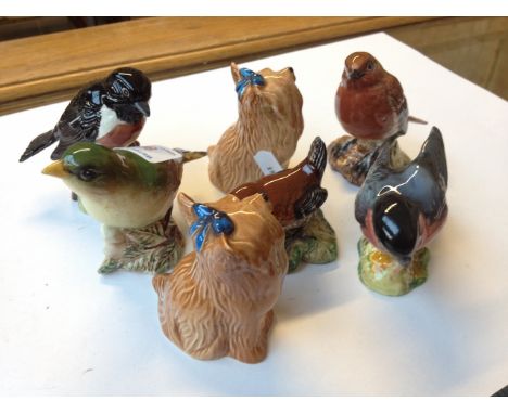 SEVEN BESWICK SMALL BIRDS AND ANIMALS    C