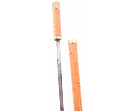 Sword cane, first half of the 19th century, 39”, slender single edge blade 24” secured by press catch, gilt mounts engraved w