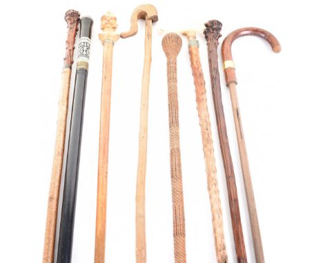 8x assorted walking sticks, including 1 entirely covered with woven bamboo; 2 with knobbly top sections; I Indian sword stick