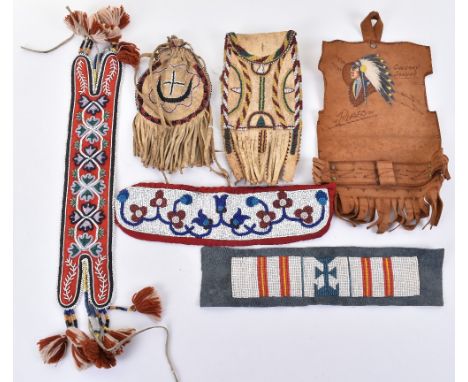 Native American beadwork comprising a collar 11” x 2.5” possibly Ojibwa first half of the 20th century, depicting flowers on 