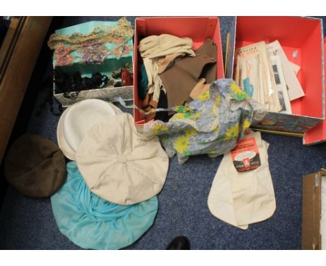 Two boxes, one containing vintage dress patterns including Simplicity and Vogue, the other containing vintage accessories to 