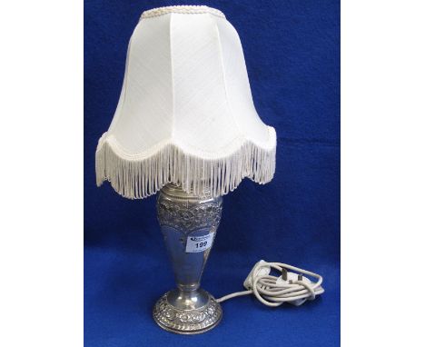 925 silver repousse decorated vase shaped table lamp with shade (possibly originally an oil lamp base).(B.P. 24% incl. VAT)  