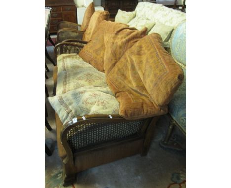 Early 20th Century single cane Bergere suite comprising three seater sofa and two armchairs. (3)(B.P. 24% incl. VAT)