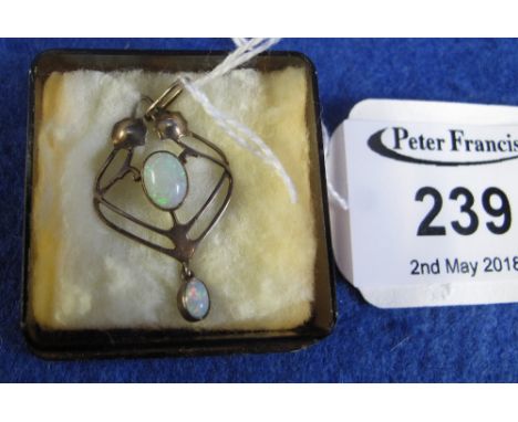 Amil Bennett &amp; Co opal pendant stamped 9ct. (B.P. 24% incl. VAT) CONDITION REPORT: Tarnished and grubby. 30 mm x 20 mm. O