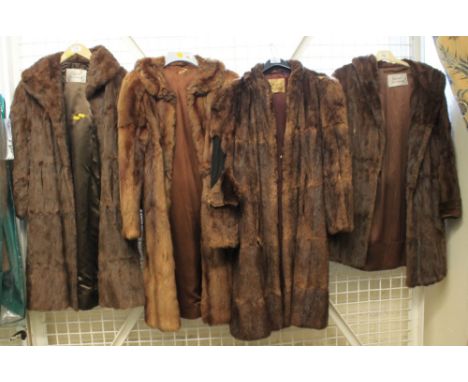 Four vintage dark brown fur coats, three of which are National Fur Company Limited.  One unlabelled.(B.P. 24% incl. VAT)