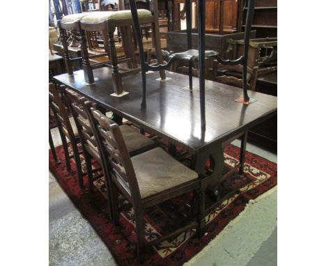 Mid 20th Century oak refectory type rectangular dining table together with a set of eight ladder back dining chairs with upho