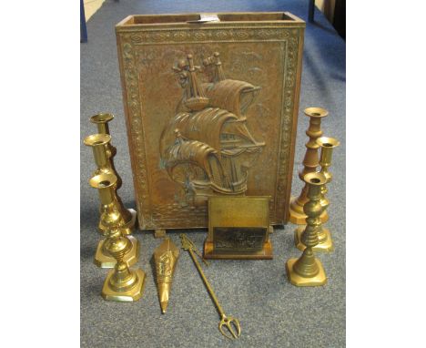 Repousse brass stick stand containing a number of brass candlesticks, letter rack etc.(B.P. 24% incl. VAT)