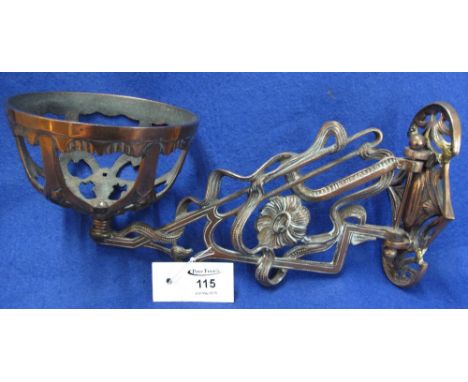 Bronzed metal oil lamp wall bracket with hinged mount, overall in foliate design.(B.P. 24% incl. VAT)