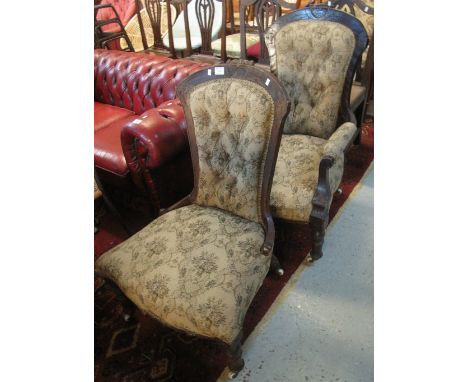 Late Victorian stained show frame button back upholstered fireside armchair, together with another similar nursing chair. (2)