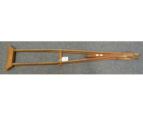 Pair of vintage wooden and leatherette adjustable crutches. (B.P. 24% incl. VAT)