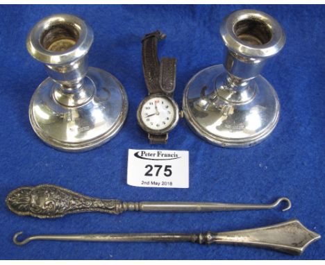 Bag of assorted silver and other items to include; pair of dwarf candlesticks, button hooks and ladies wristwatch. (B.P. 24% 