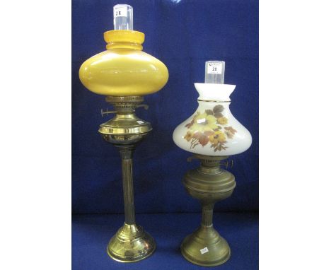 Mid Century brass double burner oil lamp with brass reservoir on reeded brass pedestal with domed base, coloured glass shade 