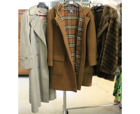 Three ladies vintage coats to include; a brown wool Burburry's duffle coat with plaid lining size 12 regular.  A faux fur coa