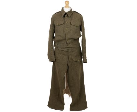 Battledress of Sergeant Arnold of the Royal Tank Regiment. 1938 pattern Battledress (BD) blouse with Corporal chevrons dated 