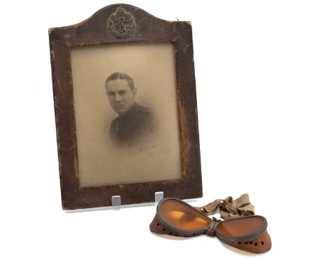 Memorabilia of a Royal Flying Corps officer. Includes (1) First World War flying goggles, folding, with orange tinted lenses,